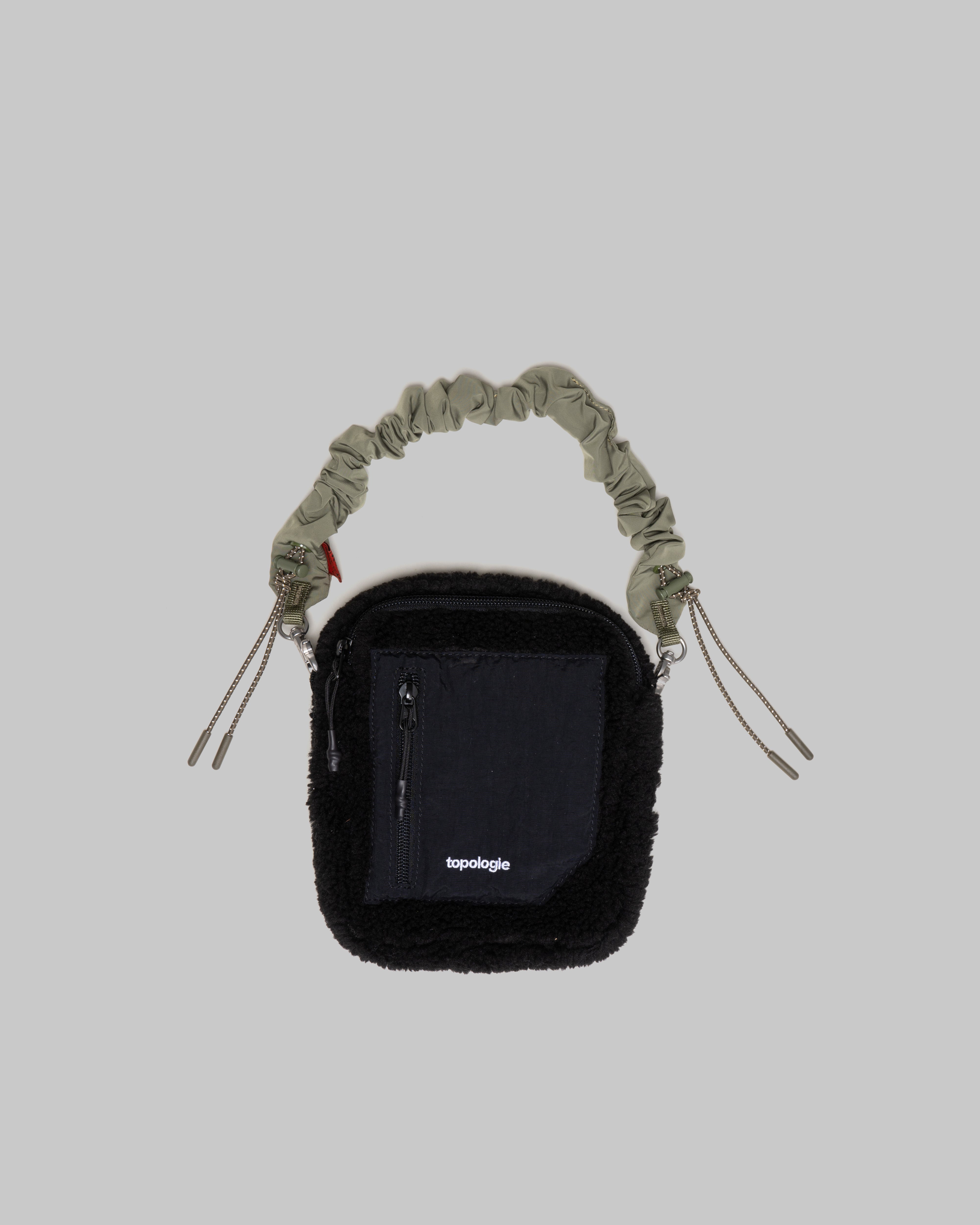 Tinbox / Fleece / Black / Bungee Wrist Strap Army – Topologie